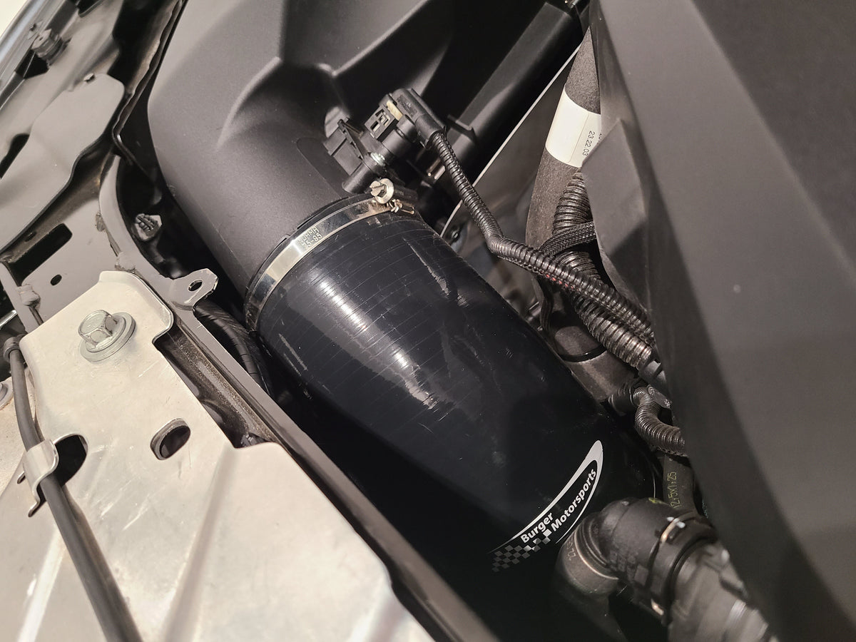 BMS silicone intake hose connected to the B58 turbo inlet on a G20 M340i