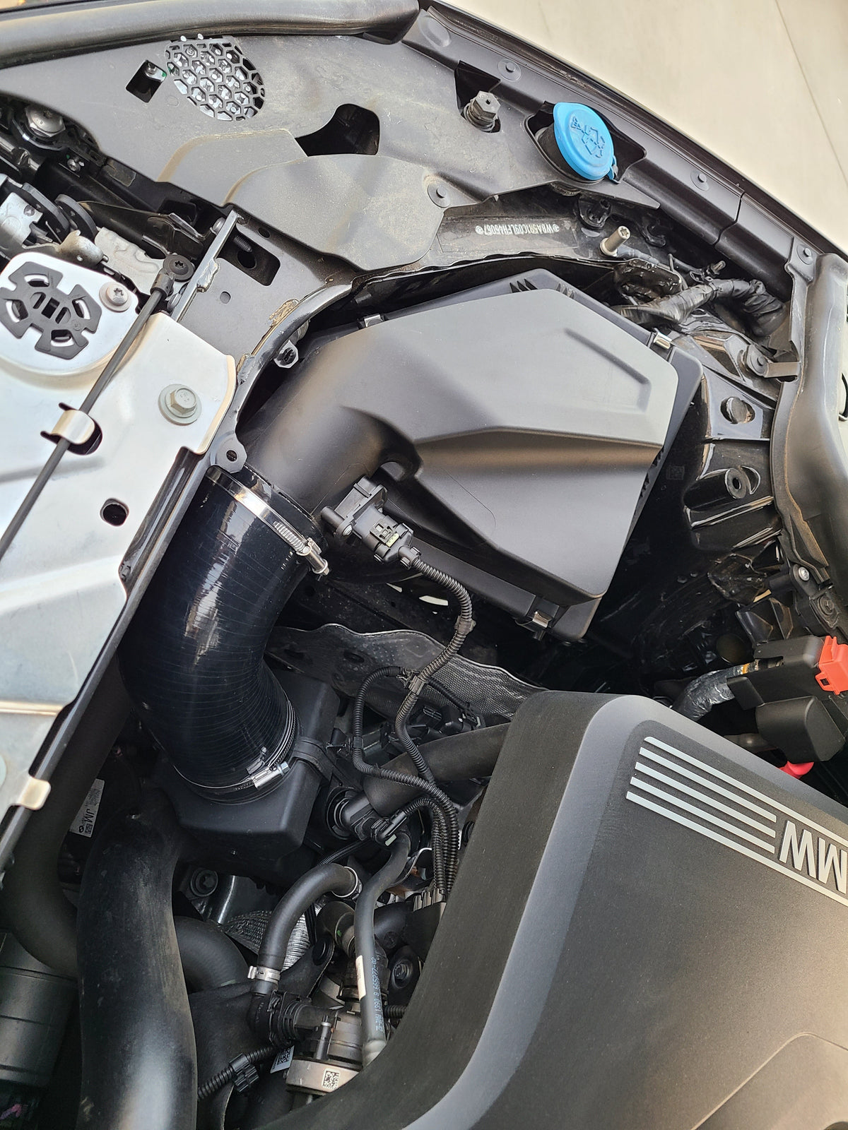 BMS silicone intake hose installed on a G20 BMW 330i B48