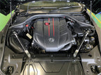 HKS Carbon Brace front set 83001-AT002 installed in GR Supra engine bay