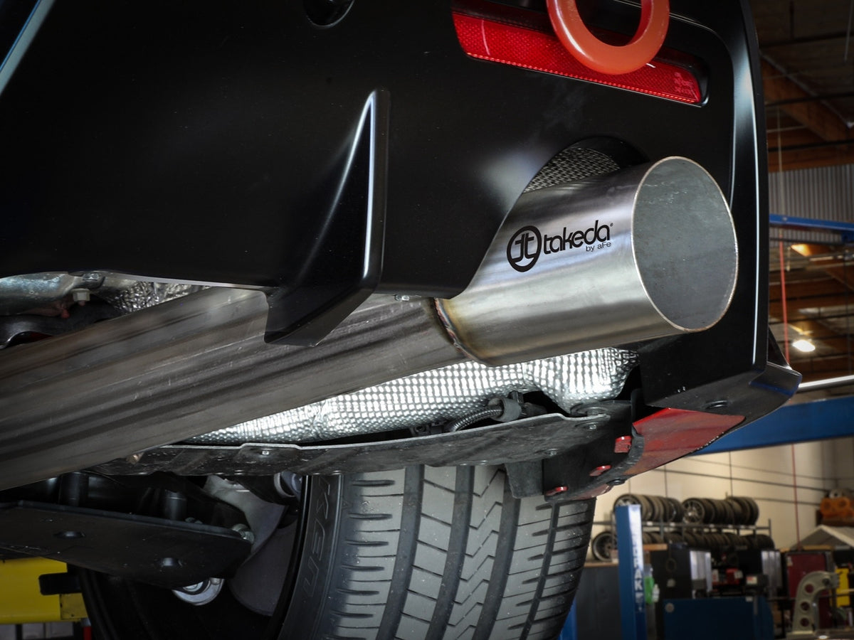 aFe Takeda 4 in. brushed exhaust tip with Takeda logo on Toyota GR Supra A90