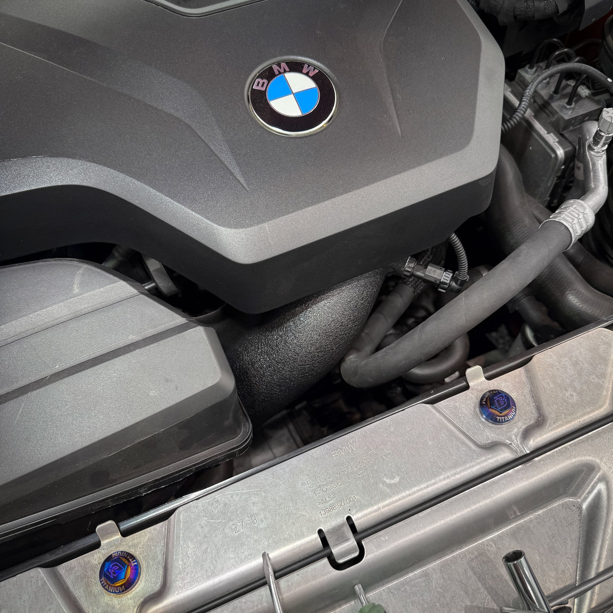 BMS B48 aluminum charge pipe in a G-chassis BMW engine bay