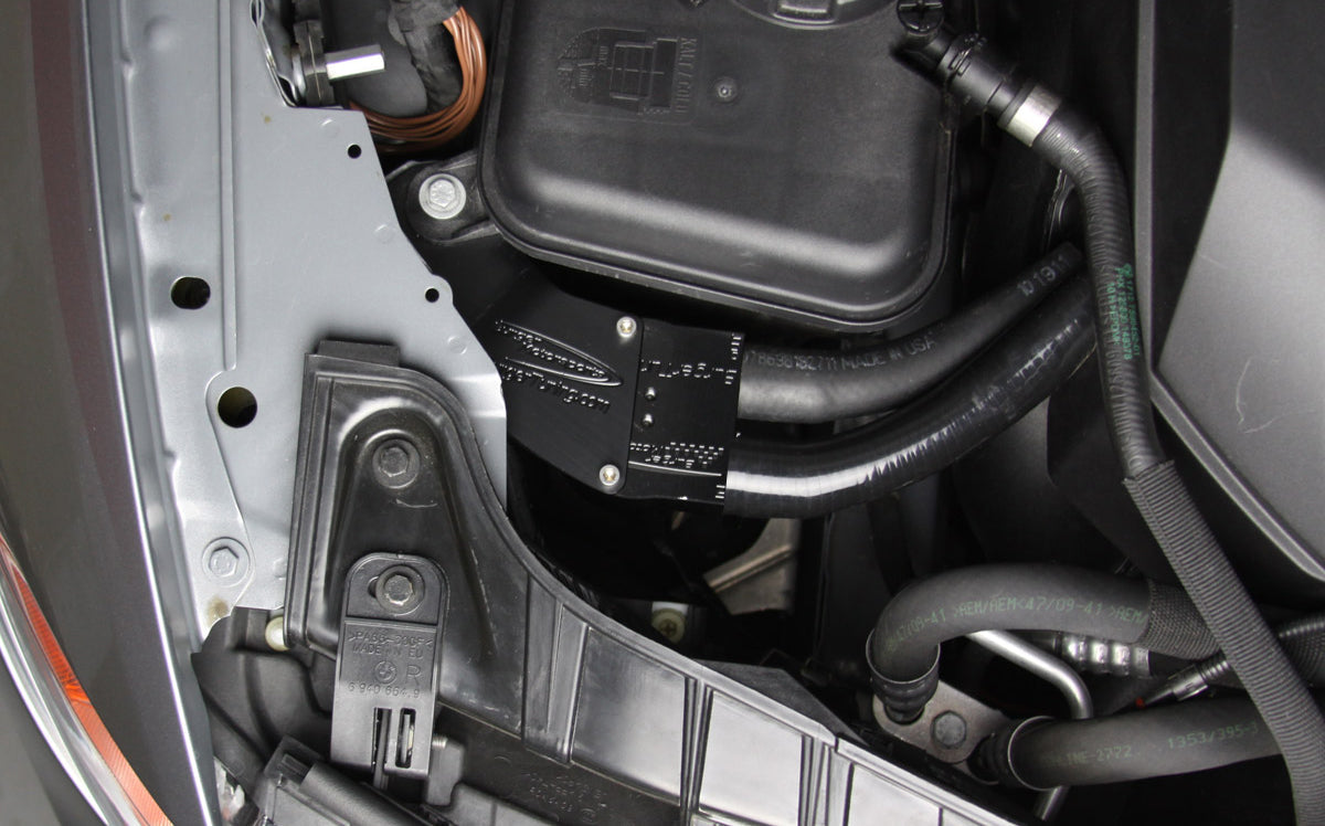 BMS N55 oil catch can installed in BMW engine bay